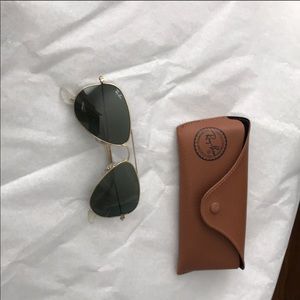 Black and gold ray bans